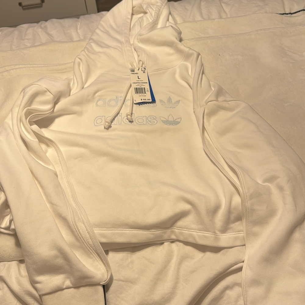 Adidas hoodie , never worn. Tags still on !